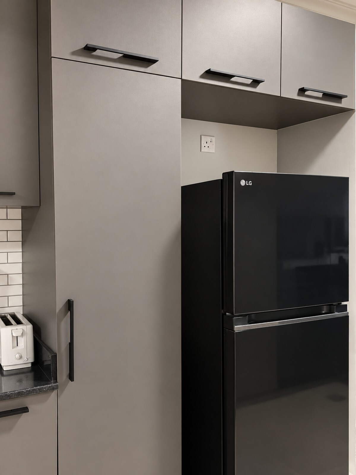 Full-size refrigerator in the kitchen